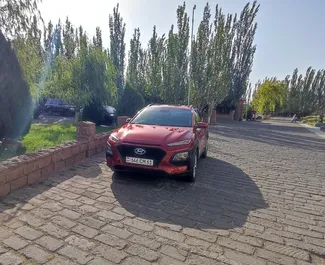 Vista frontal de um aluguel Hyundai Kona em Yerevan, Arménia ✓ Carro #9061. ✓ Transmissão Automático TM ✓ 0 avaliações.