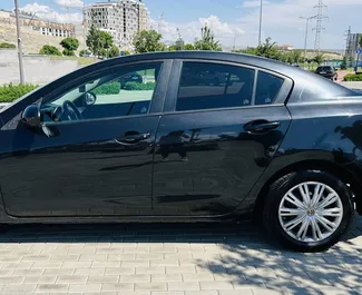 Petrol 2.0L engine of Mazda 3 2009 for rental in Yerevan.