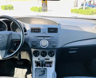 Interior of Mazda 3 for hire in Armenia. A Great 5-seater car with a Automatic transmission.