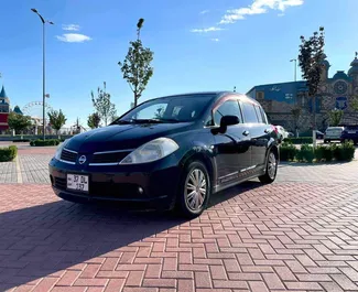 Front view of a rental Nissan Tiida in Yerevan, Armenia ✓ Car #9108. ✓ Automatic TM ✓ 1 reviews.