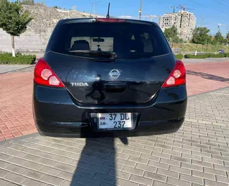 Interior of Nissan Tiida for hire in Armenia. A Great 5-seater car with a Automatic transmission.