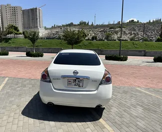 Interior of Nissan Altima for hire in Armenia. A Great 5-seater car with a Automatic transmission.