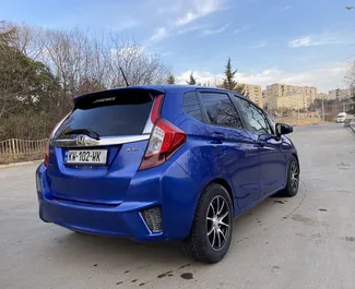 Honda Fit 2015 available for rent in Tbilisi, with unlimited mileage limit.