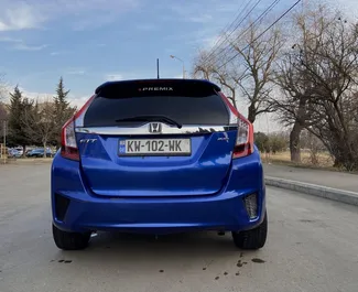 Intérieur de Honda Fit à louer en Géorgie. Une excellente voiture de 4 places avec une transmission Automatique.