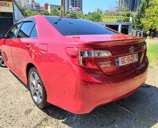 Toyota Camry 2014 available for rent in Tbilisi, with unlimited mileage limit.