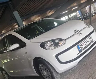 Front view of a rental Volkswagen Up at Belgrade Airport, Serbia ✓ Car #8370. ✓ Manual TM ✓ 0 reviews.