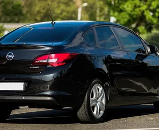 Opel Astra Sedan 2014 araç kiralama Ermenistan'da, ✓ Benzin yakıt ve 140 beygir gücü özellikleriyle ➤ Günde başlayan fiyatlarla 30 USD.