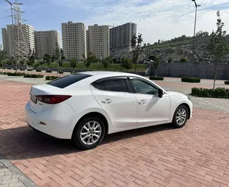 Petrol 2.0L engine of Mazda 3 2016 for rental in Yerevan.