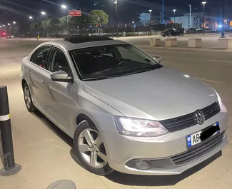 Front view of a rental Volkswagen Jetta at Tirana airport, Albania ✓ Car #9305. ✓ Automatic TM ✓ 0 reviews.