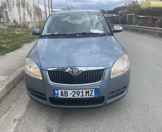 Front view of a rental Skoda Fabia at Tirana airport, Albania ✓ Car #9321. ✓ Manual TM ✓ 0 reviews.