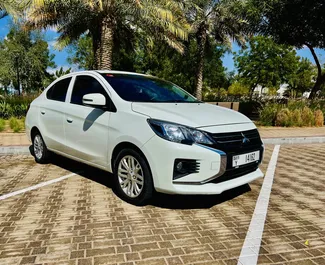 Front view of a rental Mitsubishi Attrage at Dubai Al Maktoum Airport, UAE ✓ Car #9118. ✓ Automatic TM ✓ 1 reviews.