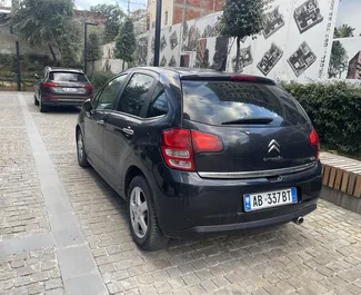 Front view of a rental Citroen C3 at Tirana airport, Albania ✓ Car #9251. ✓ Manual TM ✓ 0 reviews.