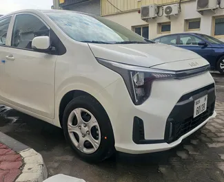 Kia Picanto 2024 car hire in the UAE, featuring ✓ Petrol fuel and 89 horsepower ➤ Starting from 85 AED per day.