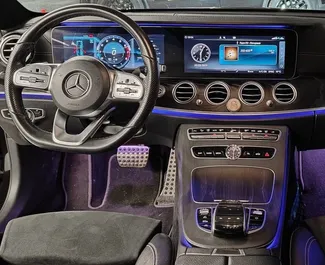 Mercedes-Benz E200 2019 car hire in Russia, featuring ✓ Petrol fuel and 184 horsepower ➤ Starting from 4990 RUB per day.