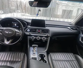 Genesis G70 2019 car hire in Russia, featuring ✓ Petrol fuel and 197 horsepower ➤ Starting from 3490 RUB per day.