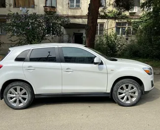 Mitsubishi Outlander Sport 2015 car hire in Georgia, featuring ✓ Petrol fuel and 146 horsepower ➤ Starting from 132 GEL per day.