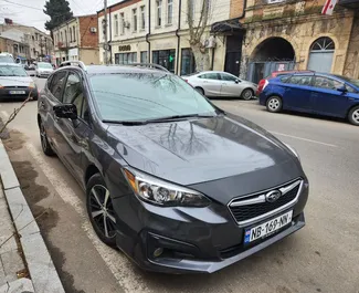 Najem avtomobila Subaru Impreza 2021 v v Gruziji, z značilnostmi ✓ gorivo Bencin in 150 konjskih moči ➤ Od 95 GEL na dan.