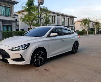 Front view of a rental MG 5/GT at Bangkok Don Muang Airport, Thailand ✓ Car #7675. ✓ Automatic TM ✓ 0 reviews.