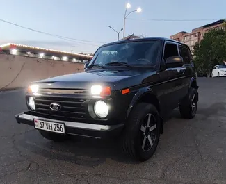 Front view of a rental Lada Niva in Yerevan, Armenia ✓ Car #9412. ✓ Manual TM ✓ 1 reviews.