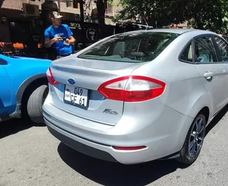 Ford Fiesta location. Économique Voiture à louer en Arménie ✓ Dépôt de 300 USD ✓ RC, CDW, Passagers, Vol, Frontière options d'assurance.