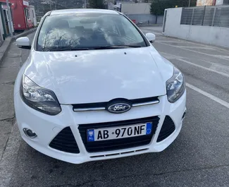 Front view of a rental Ford Focus at Tirana airport, Albania ✓ Car #9388. ✓ Manual TM ✓ 0 reviews.