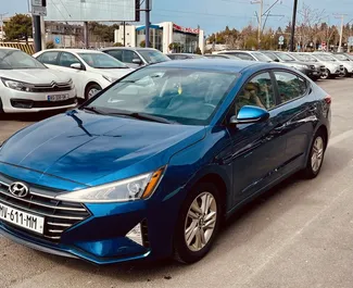 Front view of a rental Hyundai Elantra at Tbilisi Airport, Georgia ✓ Car #9556. ✓ Automatic TM ✓ 0 reviews.