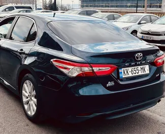 Toyota Camry 2021 available for rent at Tbilisi Airport, with unlimited mileage limit.