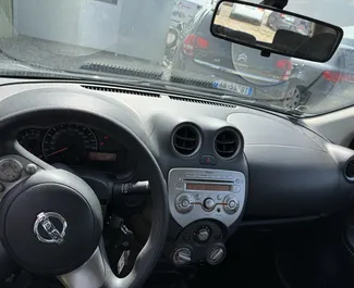 Automobilio nuoma Nissan Micra #9370 su Rankinis pavarų dėže Tiranos oro uoste, aprūpintas 1,2L varikliu ➤ Iš Amarildo Albanijoje.