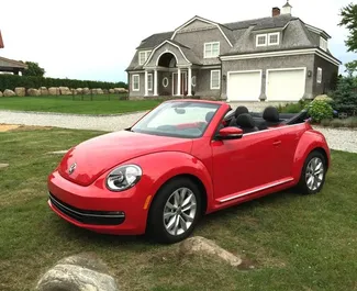 Front view of a rental Volkswagen Beetle Cabrio in Heraklion, Greece ✓ Car #9450. ✓ Automatic TM ✓ 0 reviews.