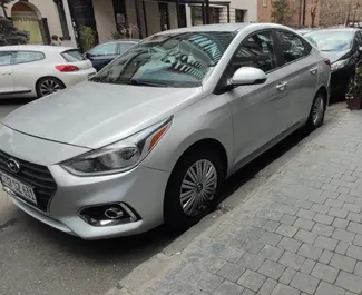 Front view of a rental Hyundai Accent in Yerevan, Armenia ✓ Car #9407. ✓ Automatic TM ✓ 0 reviews.