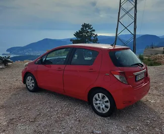 Toyota Yaris 2012 car hire in Montenegro, featuring ✓ Petrol fuel and 86 horsepower ➤ Starting from 20 EUR per day.