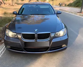 Front view of a rental BMW 320d at Tirana airport, Albania ✓ Car #9595. ✓ Manual TM ✓ 0 reviews.