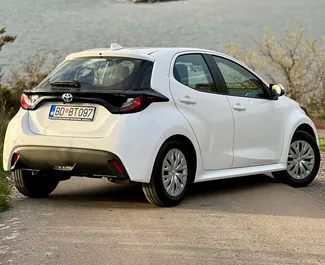 Toyota Yaris 2023 car hire in Montenegro, featuring ✓ Petrol fuel and 125 horsepower ➤ Starting from 47 EUR per day.