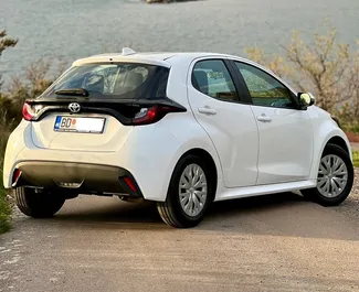 Toyota Yaris 2023 car hire in Montenegro, featuring ✓ Petrol fuel and 125 horsepower ➤ Starting from 50 EUR per day.