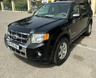 Vista frontal de um aluguel Ford Escape em Tbilisi, Geórgia ✓ Carro #9809. ✓ Transmissão Automático TM ✓ 0 avaliações.