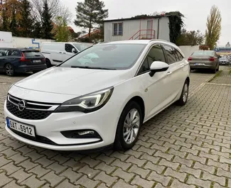Opel Astra Sports Tourer 2018 car hire in Czechia, featuring ✓ Diesel fuel and 136 horsepower ➤ Starting from 54 EUR per day.