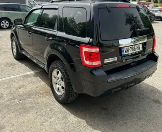 Ford Escape 2010, Tiflis'te için kiralık, sınırsız kilometre sınırı ile.