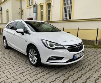Front view of a rental Opel Astra Sports Tourer in Prague, Czechia ✓ Car #3358. ✓ Automatic TM ✓ 0 reviews.