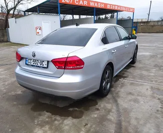 Volkswagen Passat 2013 available for rent at Kutaisi Airport, with unlimited mileage limit.