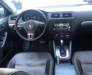 Interior of Volkswagen Jetta for hire in Albania. A Great 5-seater car with a Automatic transmission.