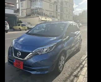 Front view of a rental Nissan Note in Limassol, Cyprus ✓ Car #9614. ✓ Automatic TM ✓ 0 reviews.