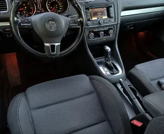 Interior of Volkswagen Golf 6 for hire in Albania. A Great 5-seater car with a Automatic transmission.