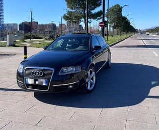 Μπροστινή όψη ενοικιαζόμενου Audi A6 Avant στα Τίρανα, Αλβανία ✓ Αριθμός αυτοκινήτου #9975. ✓ Κιβώτιο ταχυτήτων Αυτόματο TM ✓ 1 κριτικές.