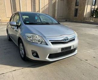 Front view of a rental Toyota Auris at Tirana airport, Albania ✓ Car #9921. ✓ Automatic TM ✓ 0 reviews.