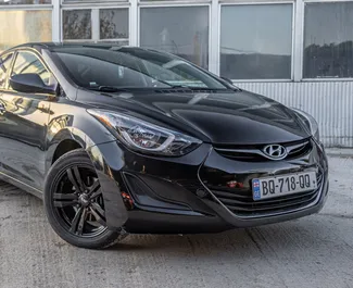 Vista frontal de um aluguel Hyundai Elantra em Tbilisi, Geórgia ✓ Carro #9872. ✓ Transmissão Manual TM ✓ 1 avaliações.