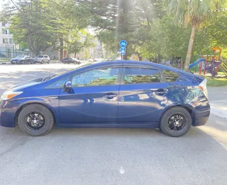 Hybrid 1.8L engine of Toyota Prius 2014 for rental in Kutaisi.