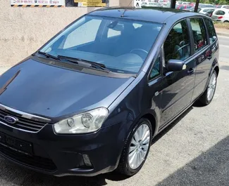 Front view of a rental Ford C-Max at Tirana airport, Albania ✓ Car #10125. ✓ Manual TM ✓ 0 reviews.