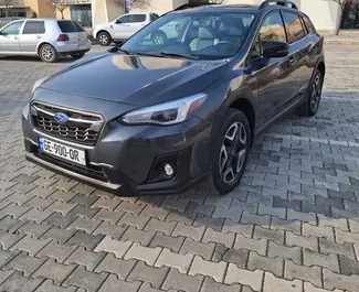 Sprednji pogled najetega avtomobila Subaru Crosstrek v v Tbilisiju, Georgia ✓ Avtomobil #10131. ✓ Menjalnik Samodejno TM ✓ Mnenja 0.