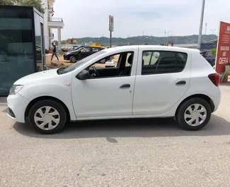 Dacia Sandero 2017 araç kiralama Arnavutluk'ta, ✓ Dizel yakıt ve 76 beygir gücü özellikleriyle ➤ Günde başlayan fiyatlarla 30 EUR.