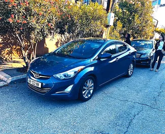 Vista frontal de um aluguel Hyundai Elantra em Tbilisi, Geórgia ✓ Carro #6501. ✓ Transmissão Automático TM ✓ 2 avaliações.